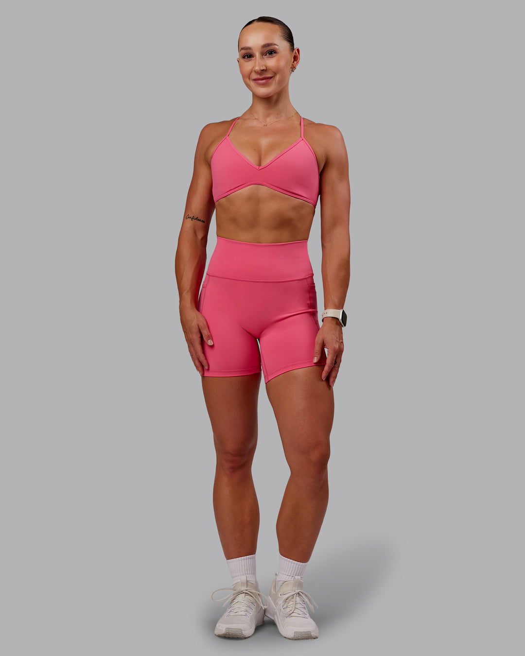 Woman wearing Ambience Sports Bra - Hot Pink