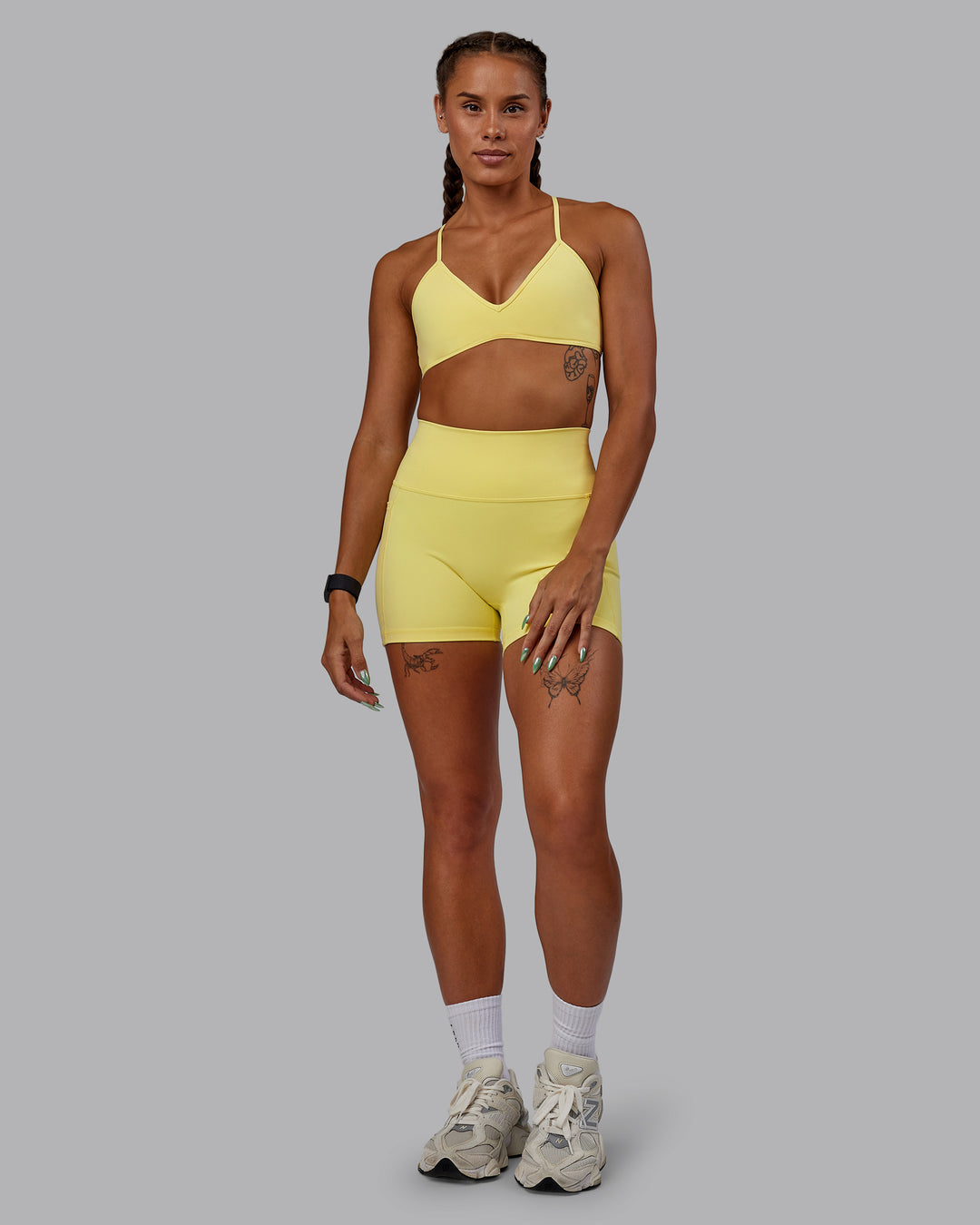 Woman wearing Ambience Sports Bra - Lemon Fizz