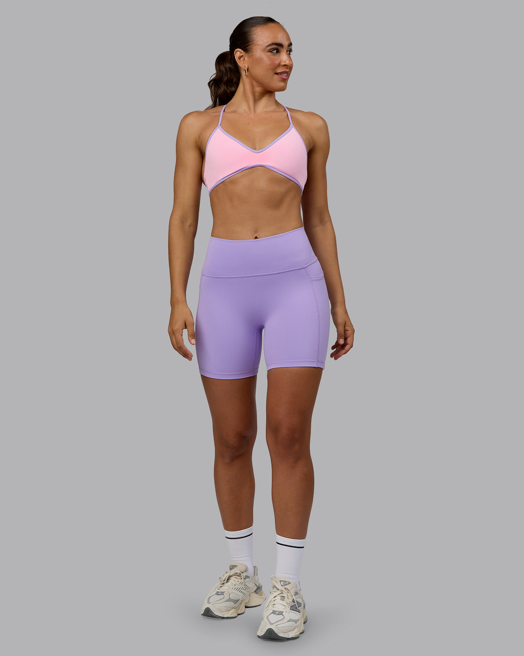 Woman wearing Ambience Sports Bra - Pale Pink-Pale Lilac