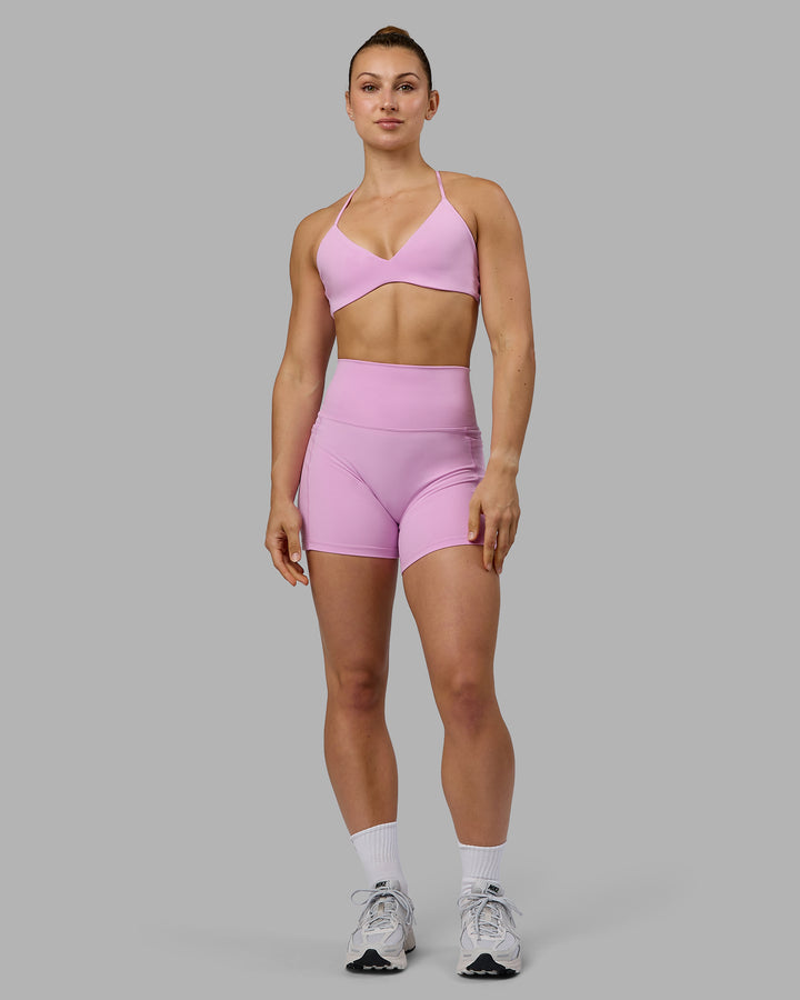 Woman wearing Aura Sports Bra - Pastel Orchid
