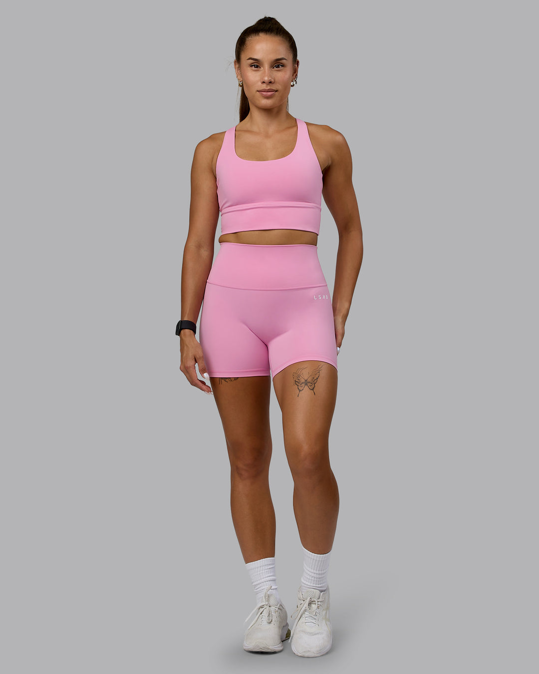 Woman wearing Base 2.0 X-Short Tights - Bubblegum