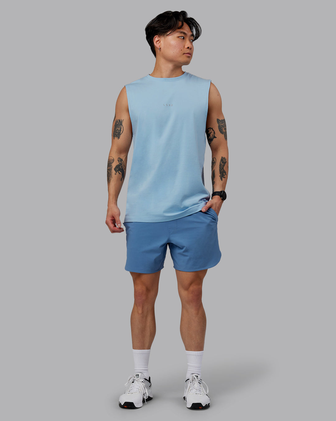 Man wearing Base FLXCotton Tank - Ice Blue