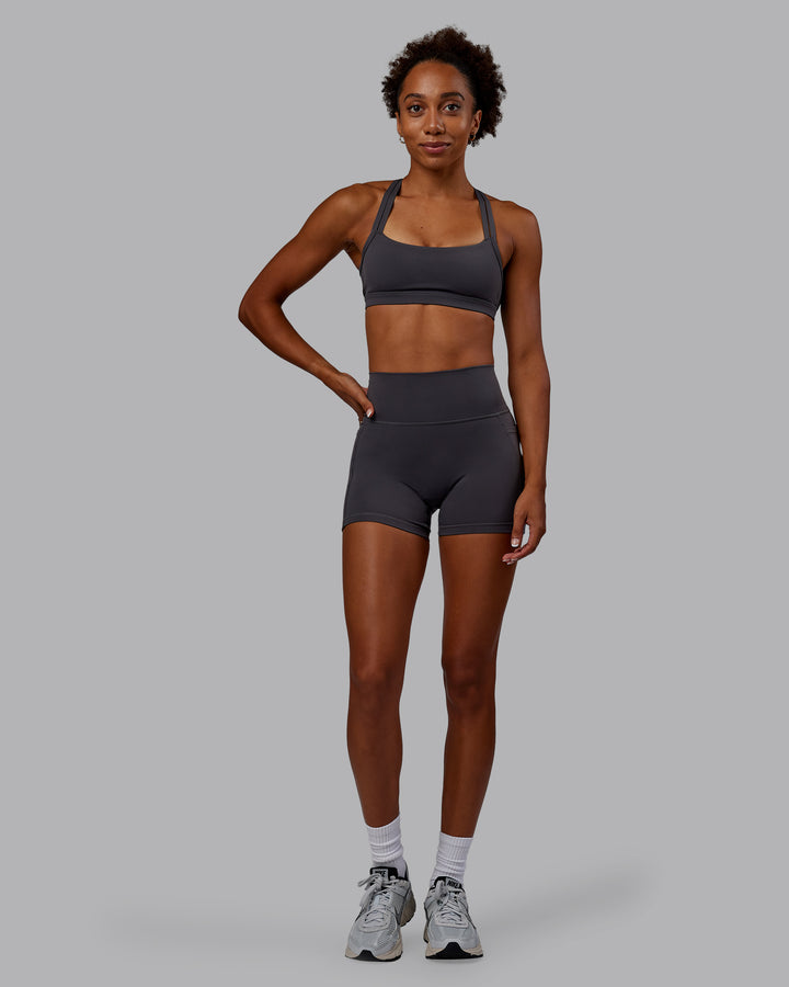 Woman wearing Bree Masters Velocity Sports Bra - Stormy
