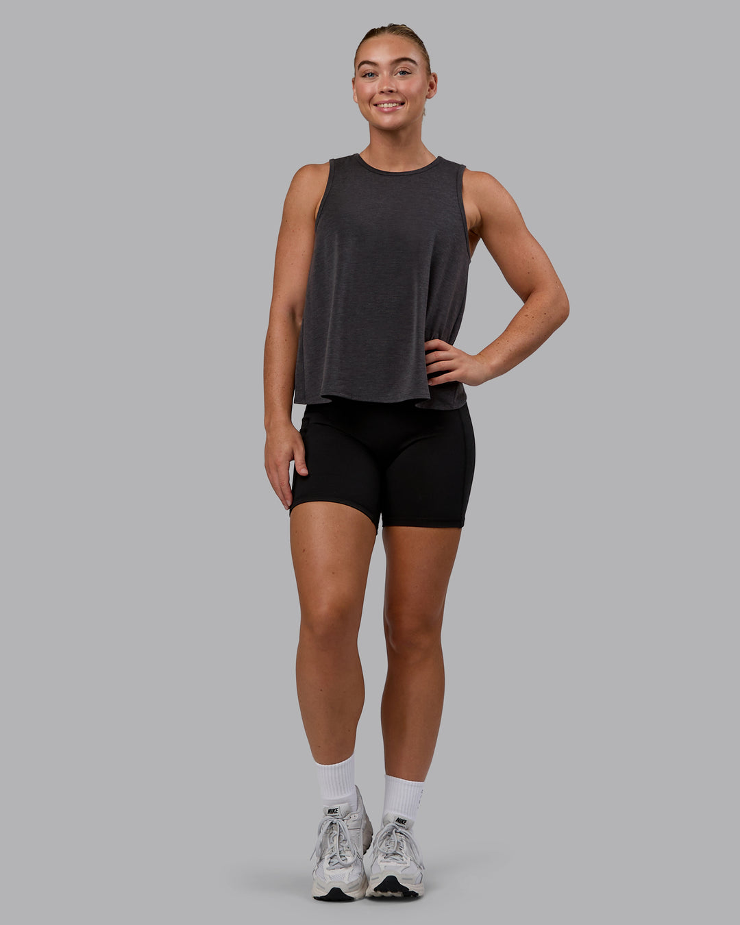 Woman wearing Breeze Training Tank - Black