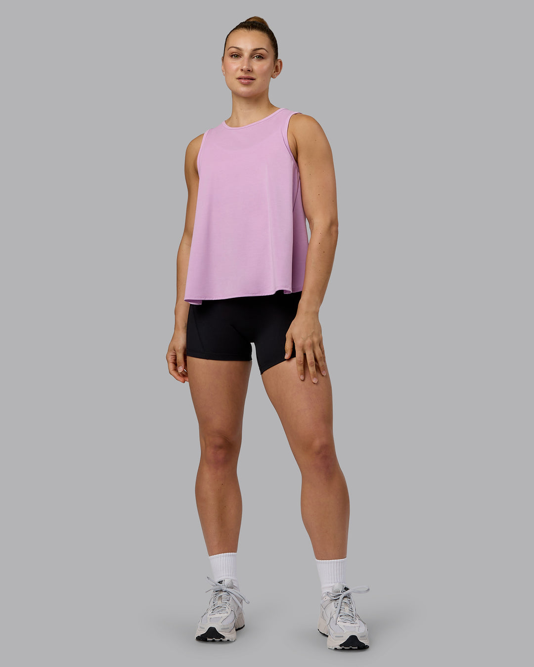 Woman wearing Breeze Training Tank - Pastel Orchid