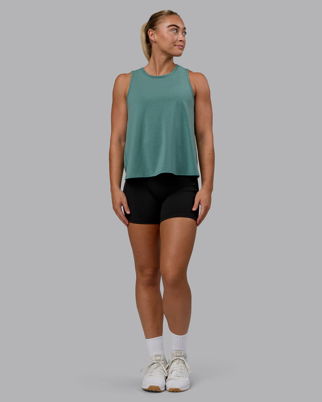 Woman wearing Breeze Training Tank - Sagebrush