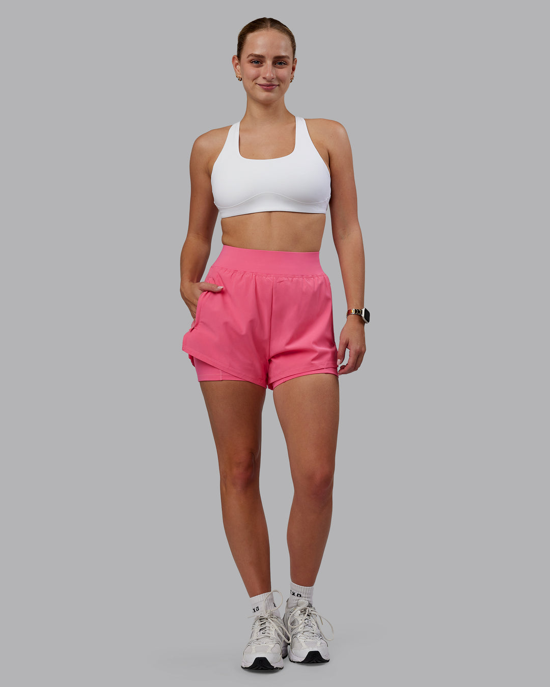 Woman wearing Challenger 3&quot; Lined Performance Shorts in Pink Lemonade | Size:S