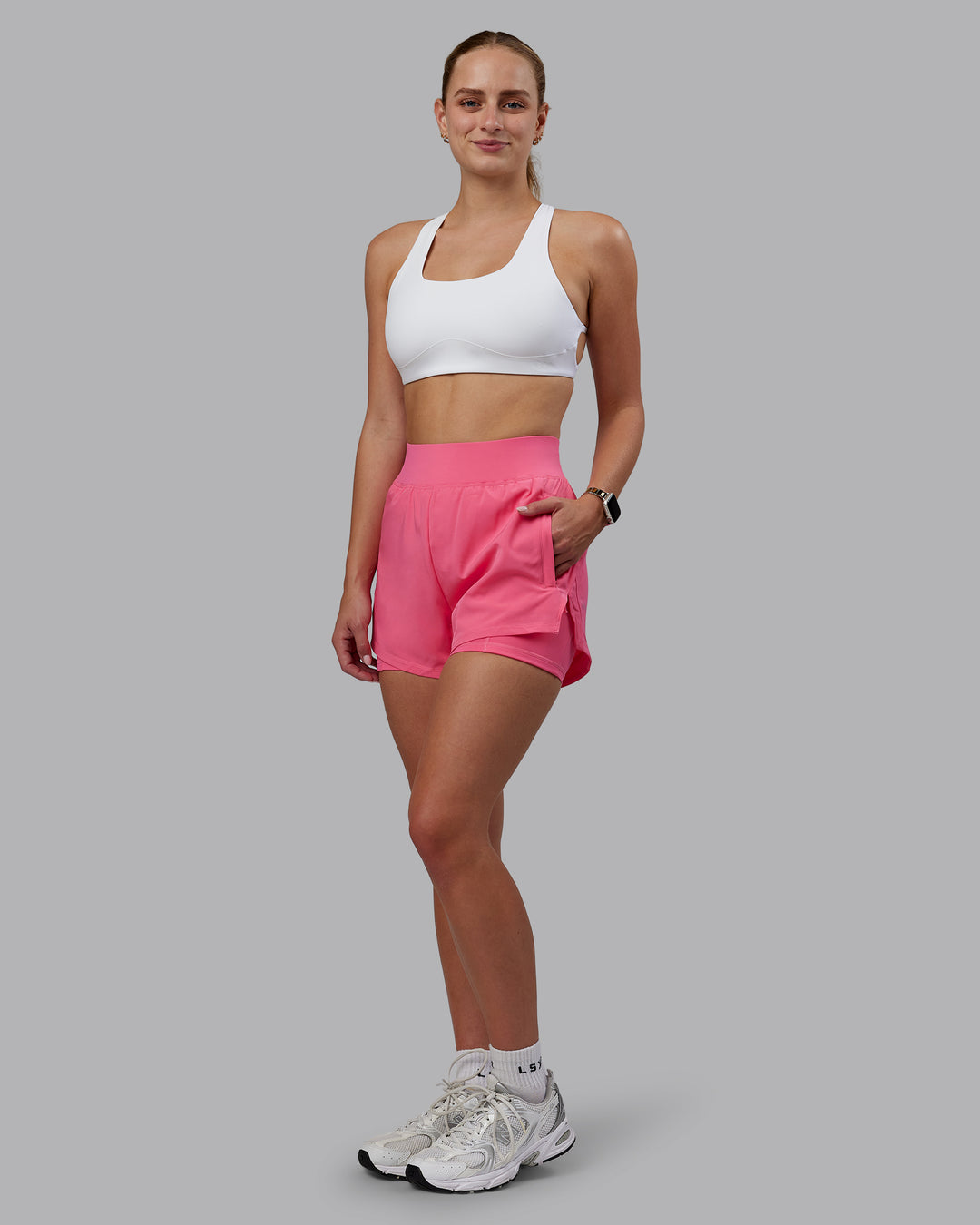 Woman wearing Challenger 3&quot; Lined Performance Shorts in Pink Lemonade | Size:S