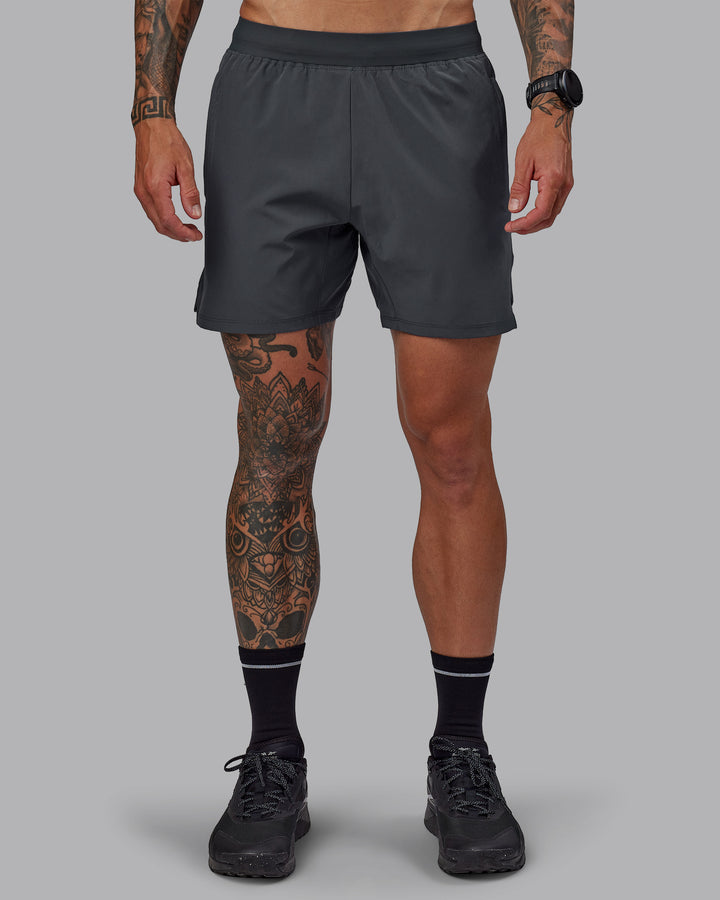 Man wearing Challenger 6&quot; Performance Short in Dark Storm | Size:S
