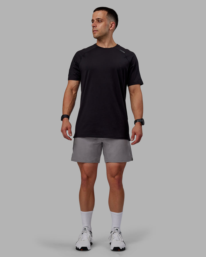 Man wearing Challenger 6&quot; Performance Shorts - Storm Front
