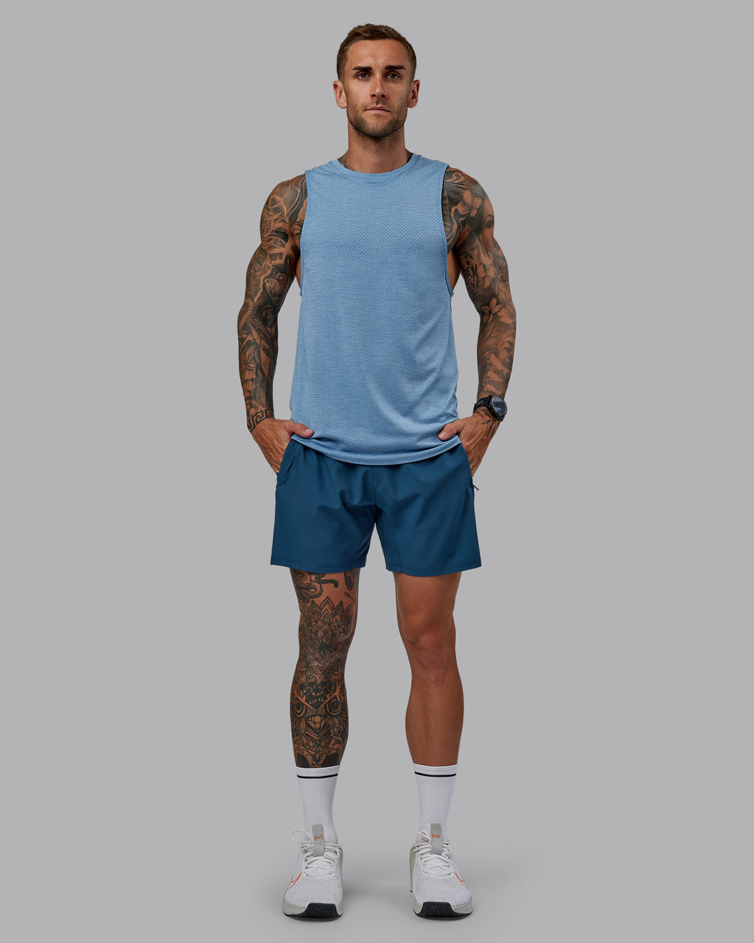 Man wearing Challenger 6&quot; Performance Short in Indigo | Size:S