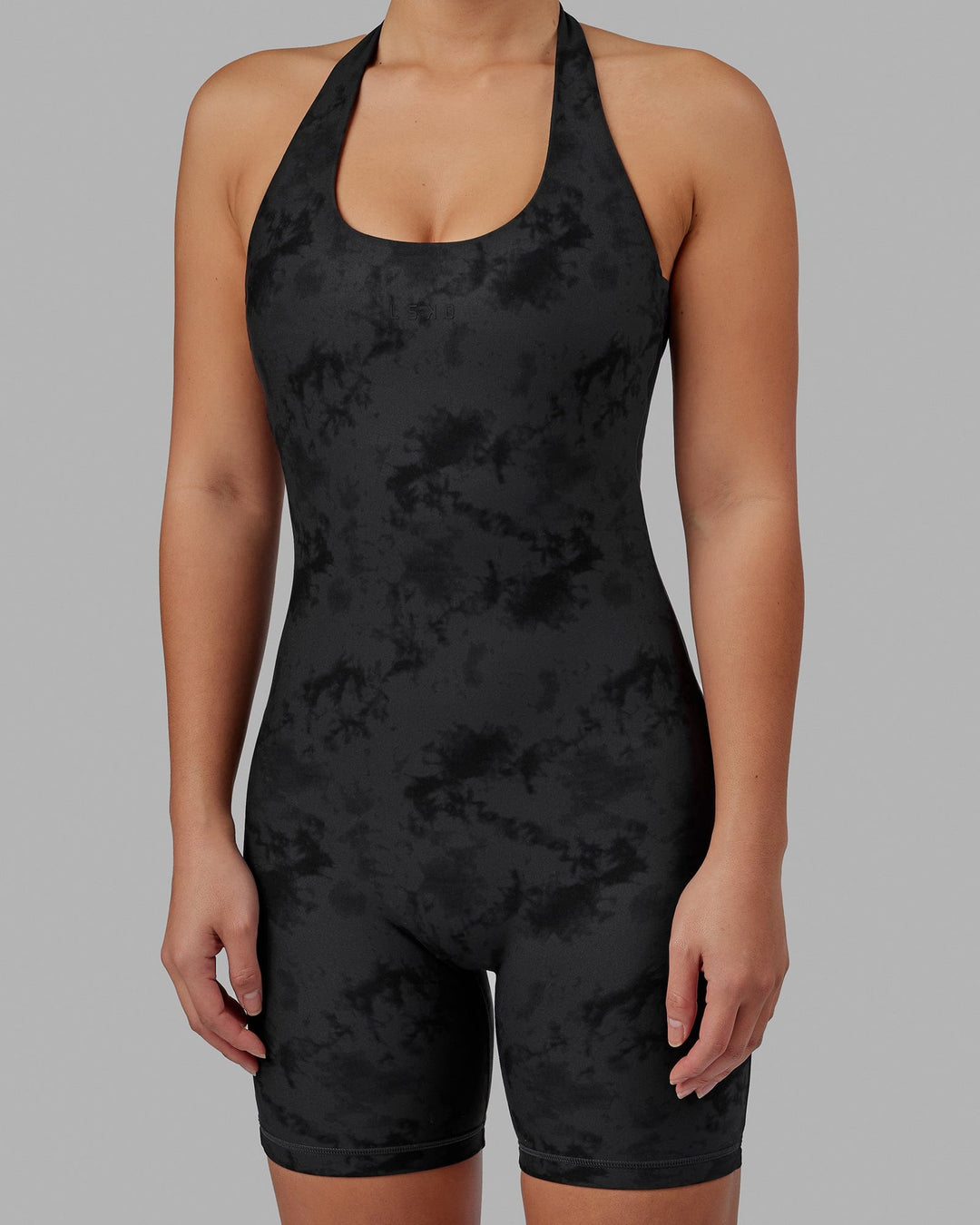 Woman wearing Challenger Bodysuit - Black Tie-Dye