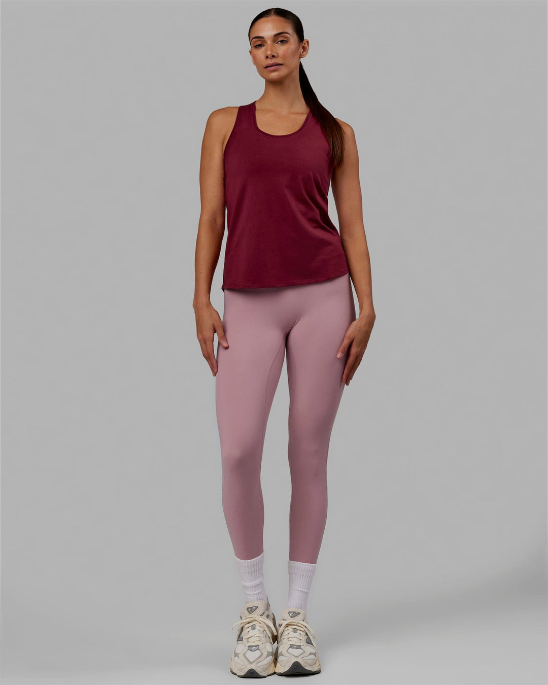 Woman wearing Charge PimaFLX-Lite Active Tank - Cranberry