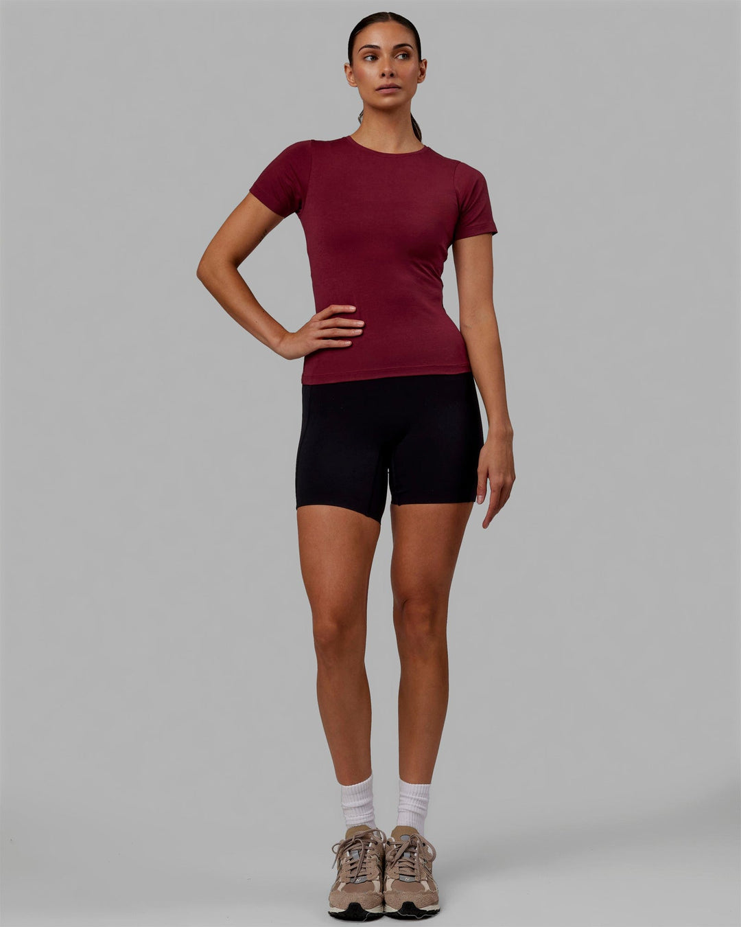 Woman wearing Charge PimaFLX-Lite Fitted Tee - Cranberry