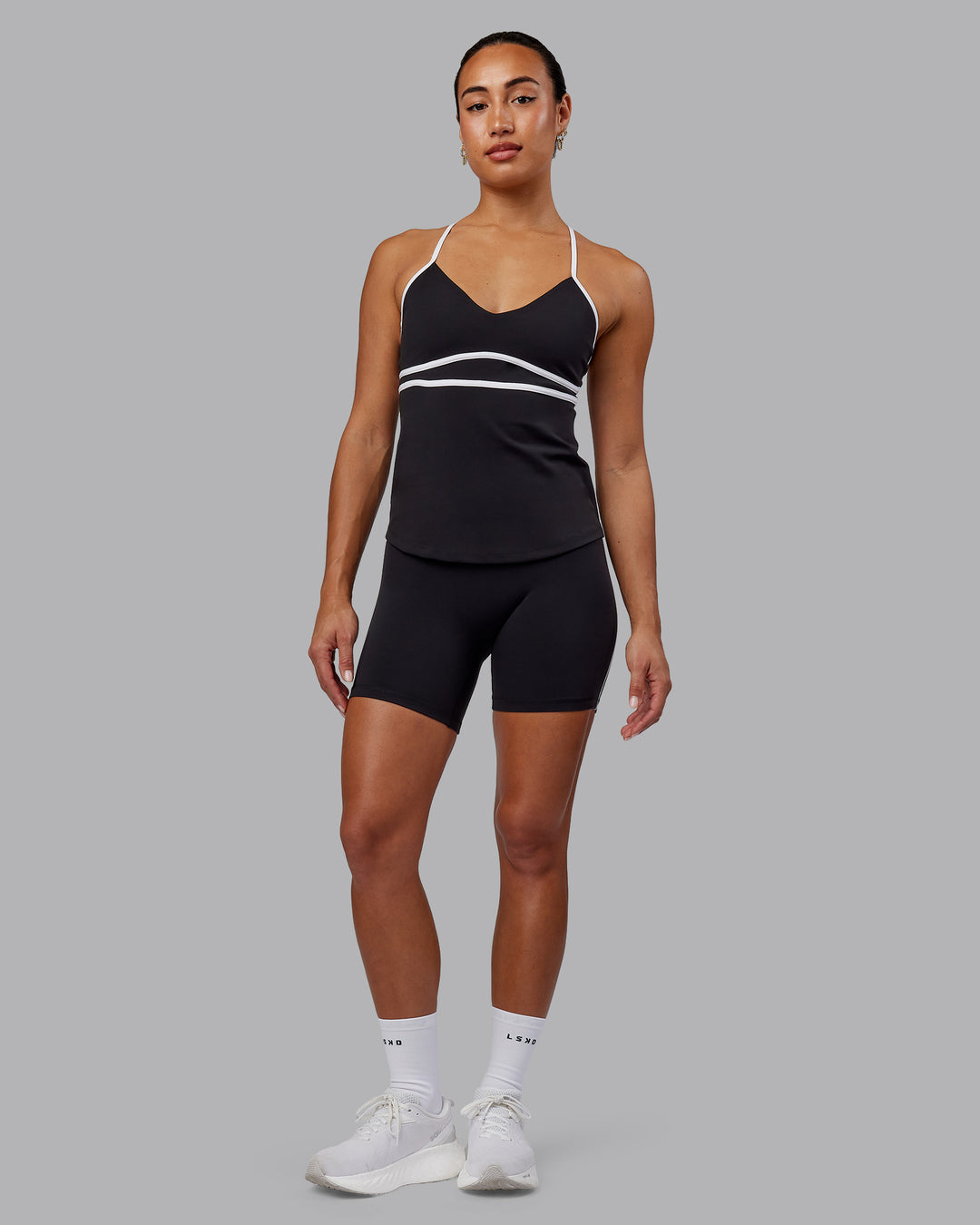 Woman wearing Distinction Performance Tank - Black-White