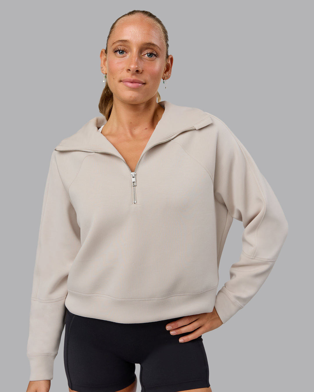 Woman wearing Elevate SoftTouch 1/2 Zip Sweater in Shale Beige | Size:S