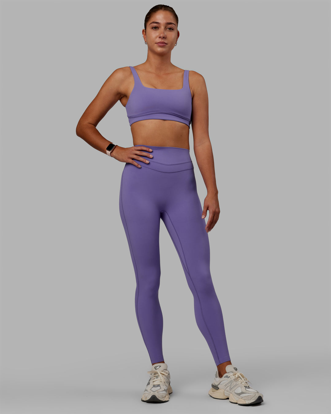 Woman wearing Elevation Sports Bra - Dahlia Purple