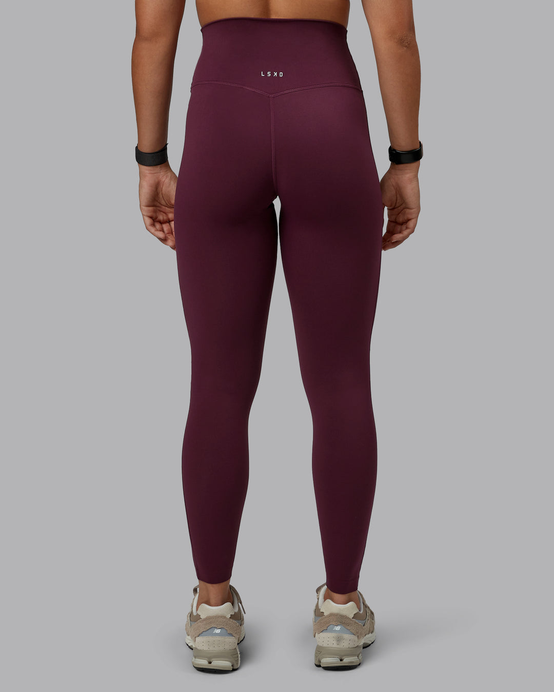 Woman wearing Elixir Full Length Tight in Cherry Lacquer | Size:S