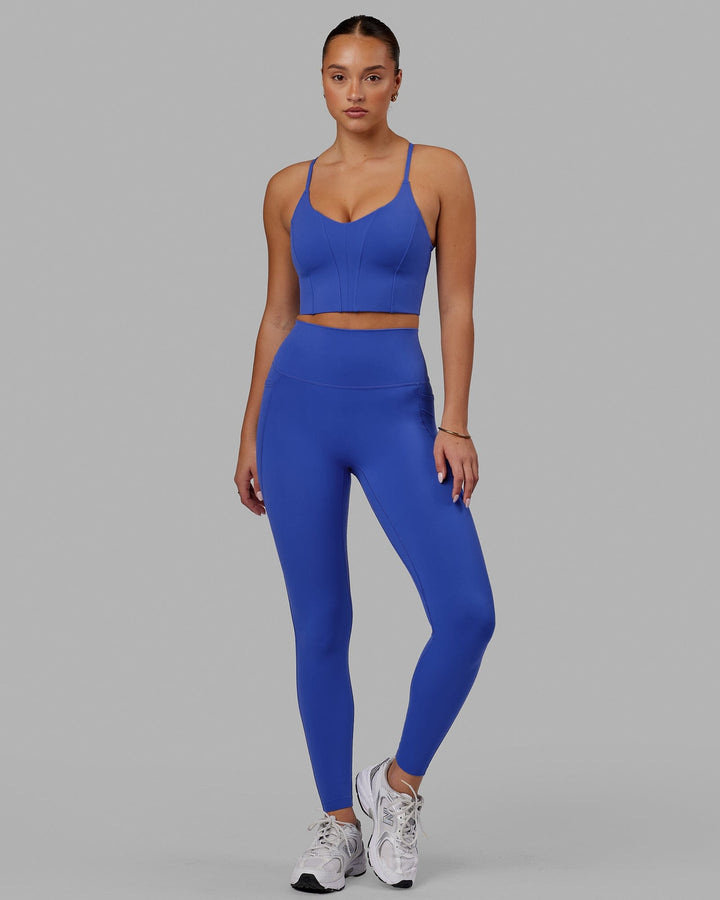 Woman wearing Elixir Full Length Tight With Pockets - Power Cobalt
