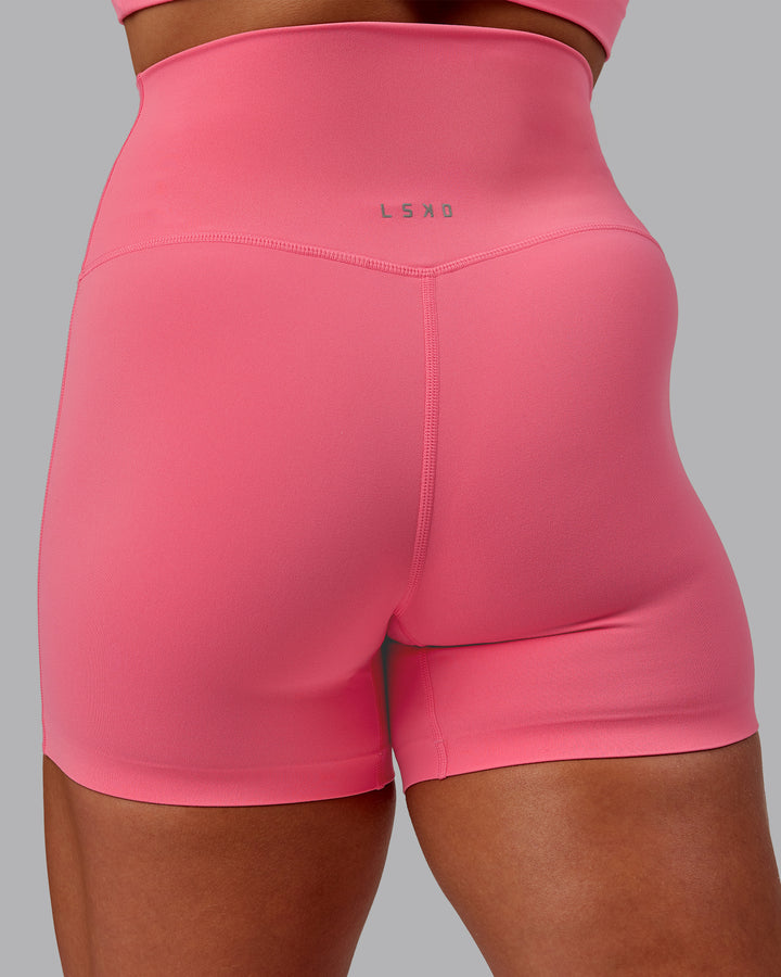 Woman wearing Elixir X-Short Tight in Pink Lemonade | Size:S
