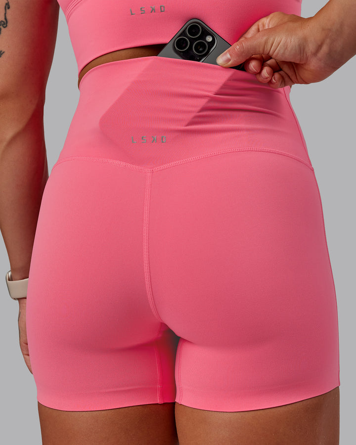 Woman wearing Elixir X-Short Tight in Pink Lemonade | Size:S
