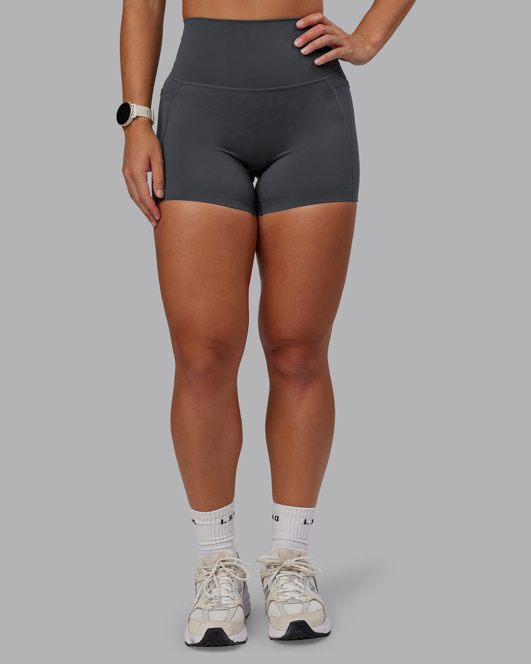 Woman wearing Elixir X-Short Tights With Pockets in Dark Storm | Size:S