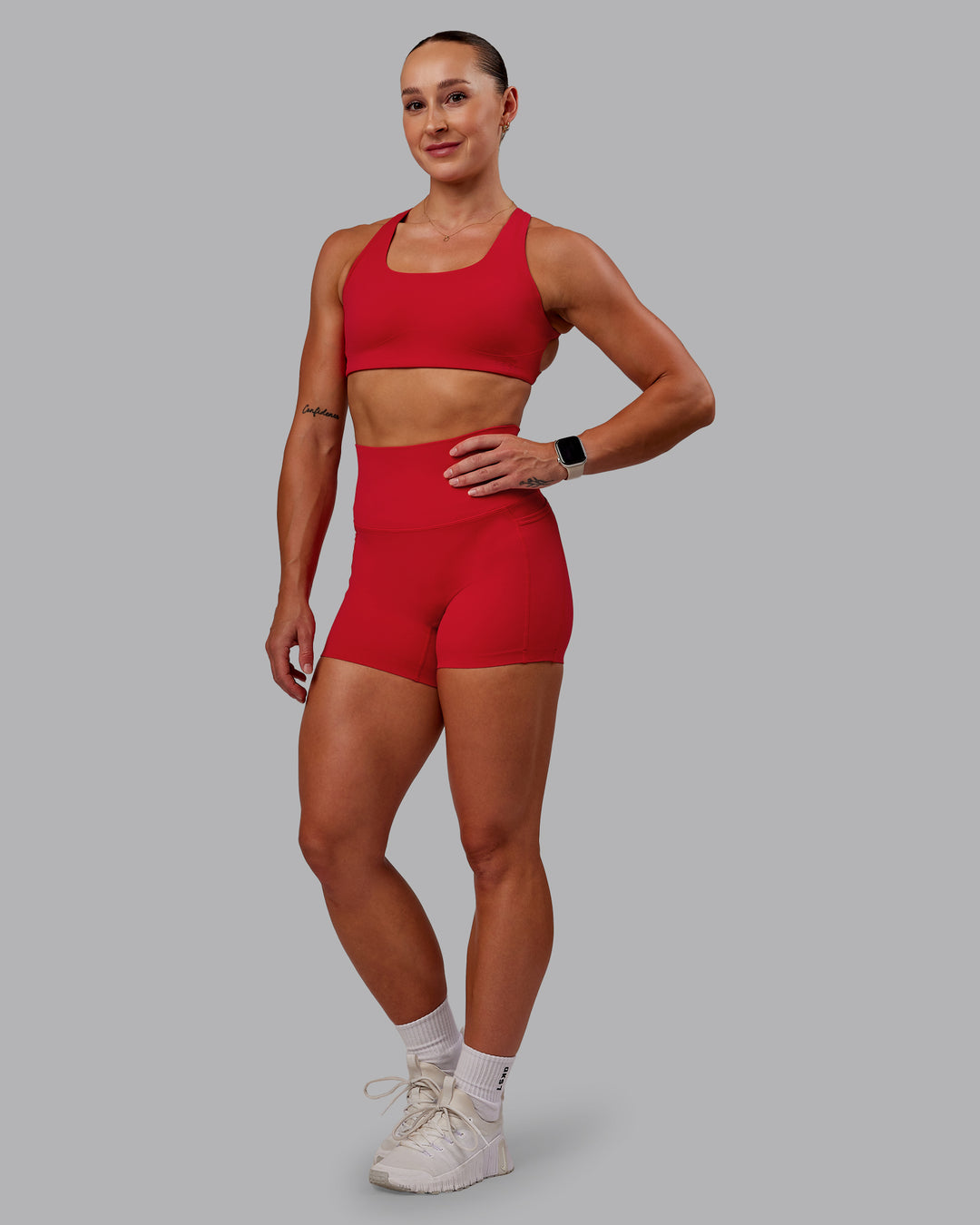 Woman wearing Elixir X-Short Tights With Pockets in Flame | Size:S