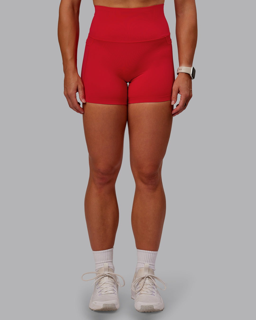 Woman wearing Elixir X-Short Tights With Pockets in Flame | Size:S