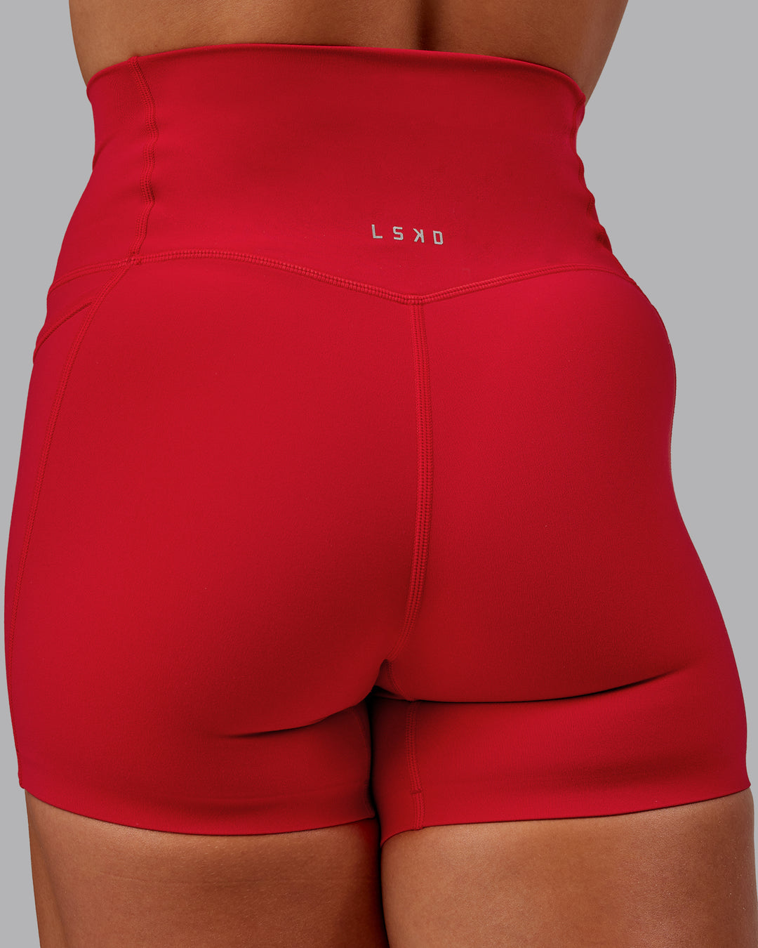 Woman wearing Elixir X-Short Tights With Pockets in Flame | Size:S