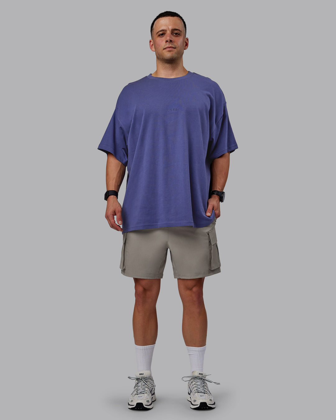 Man wearing Energy Stretch Performance Cargo Shorts - Elephant