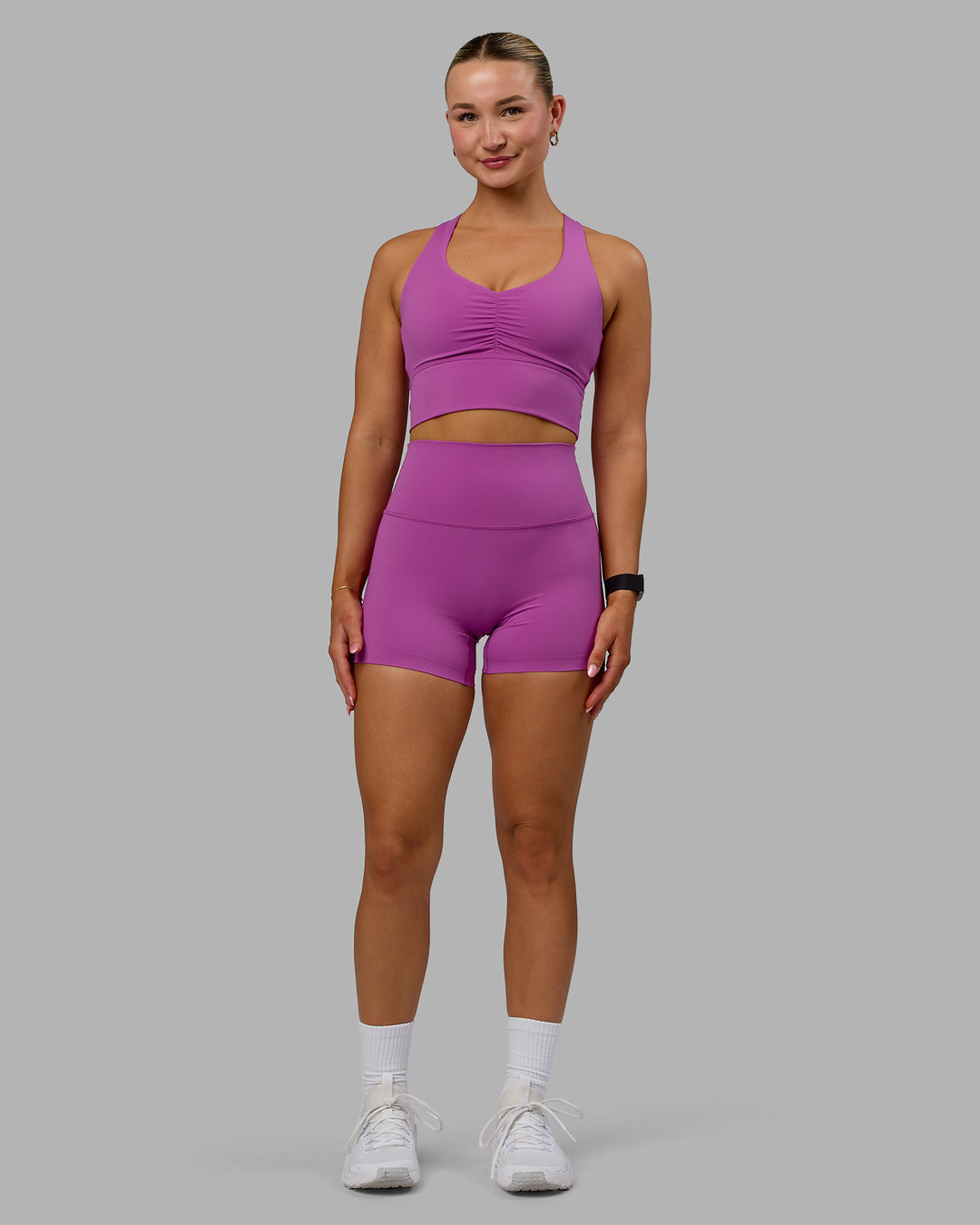 Woman wearing Evoke Sports Bra - Orchid