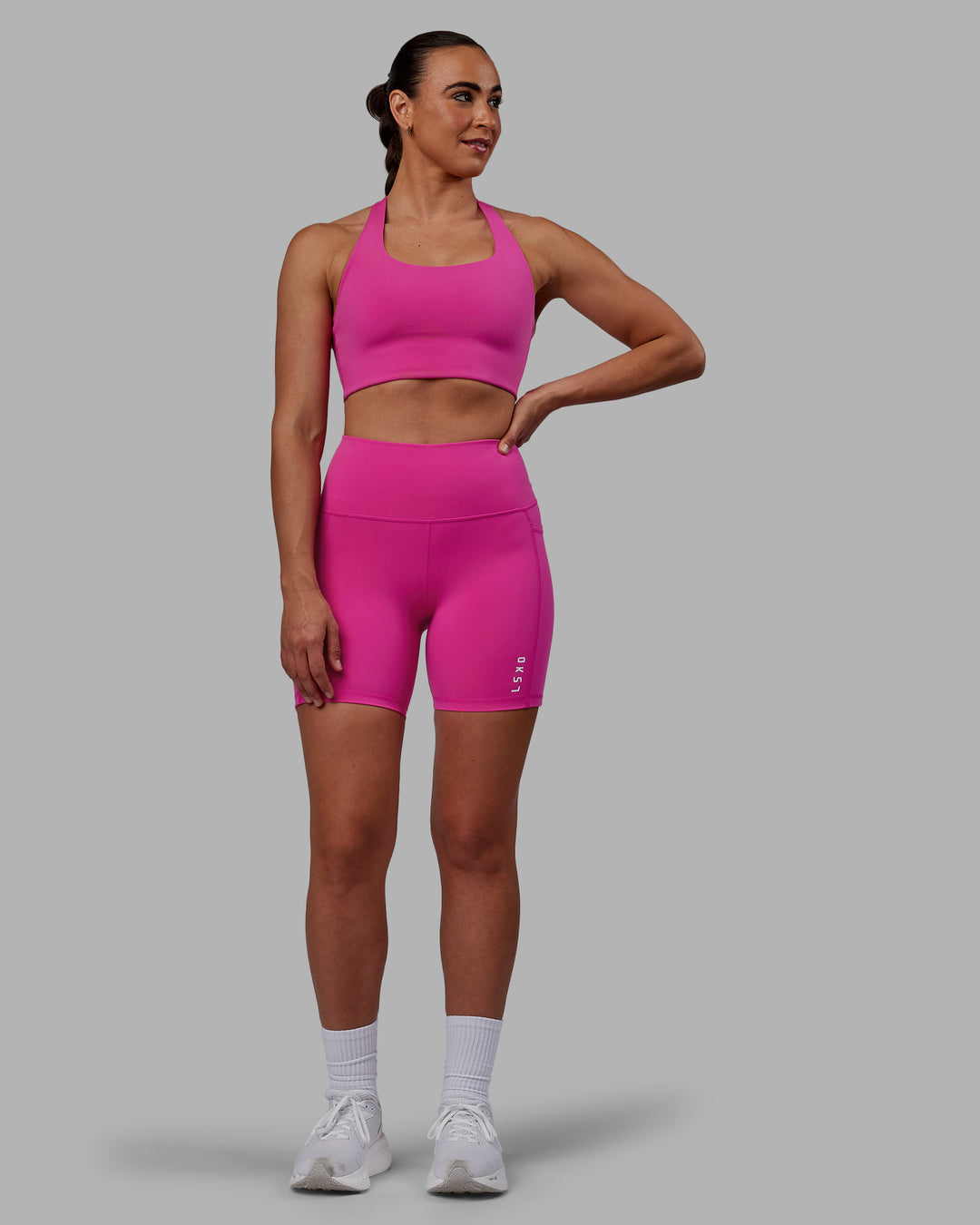 Woman wearing Flux Mid Short Tights - Fuchsia Pink