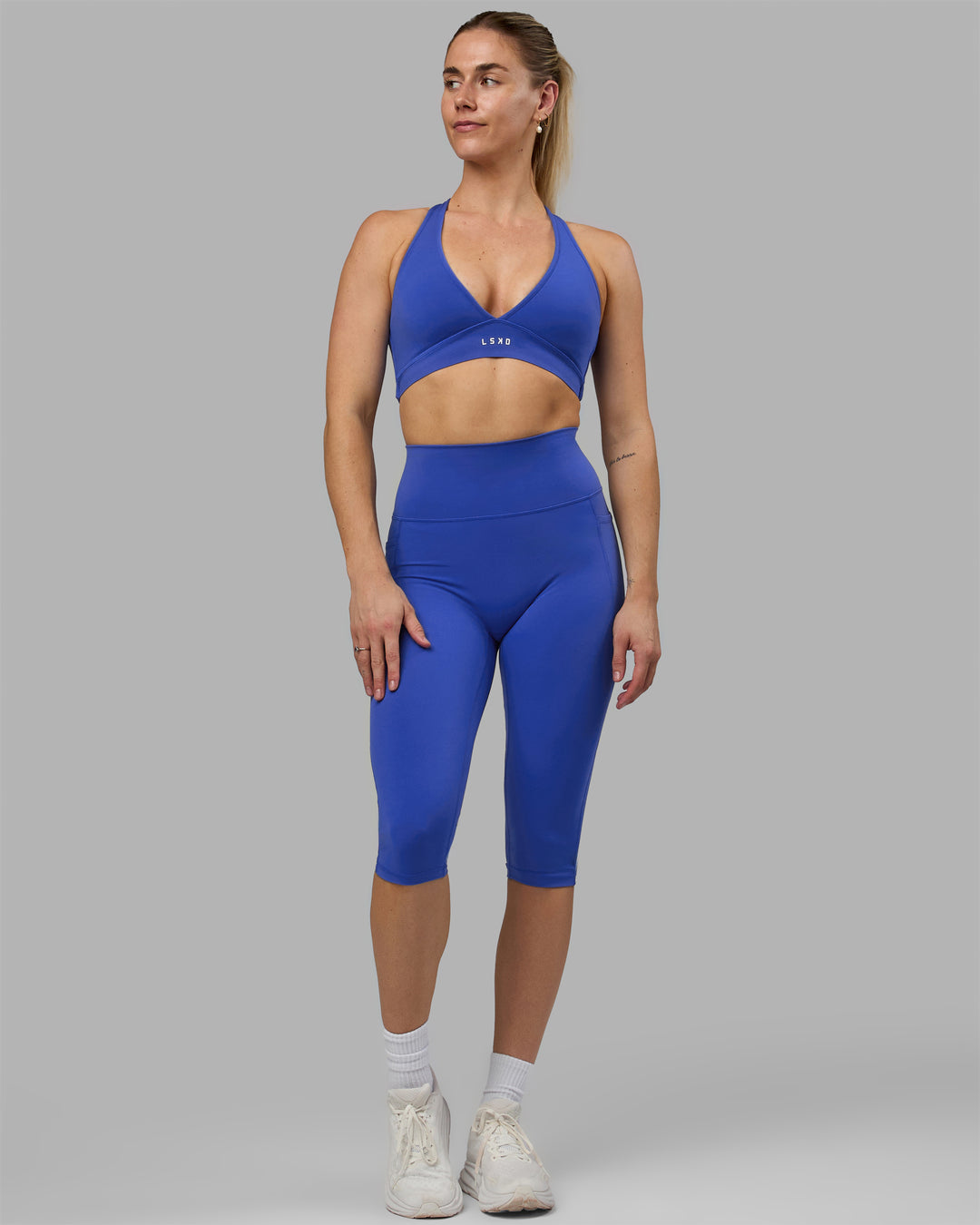 Woman wearing Fusion 3/4 Length Tights - Power Cobalt