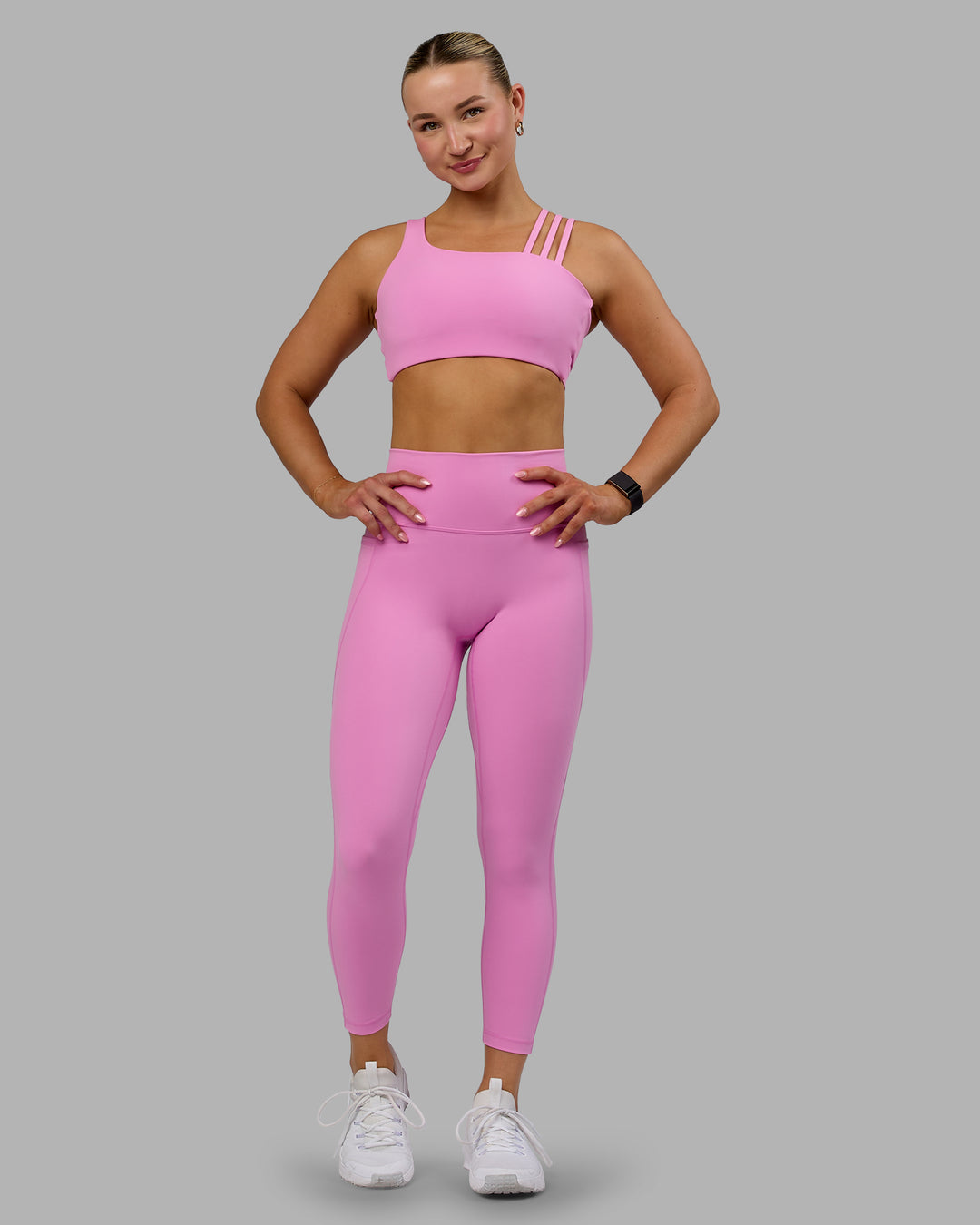 Woman wearing Fusion 7/8 Length Tights - Spark Pink