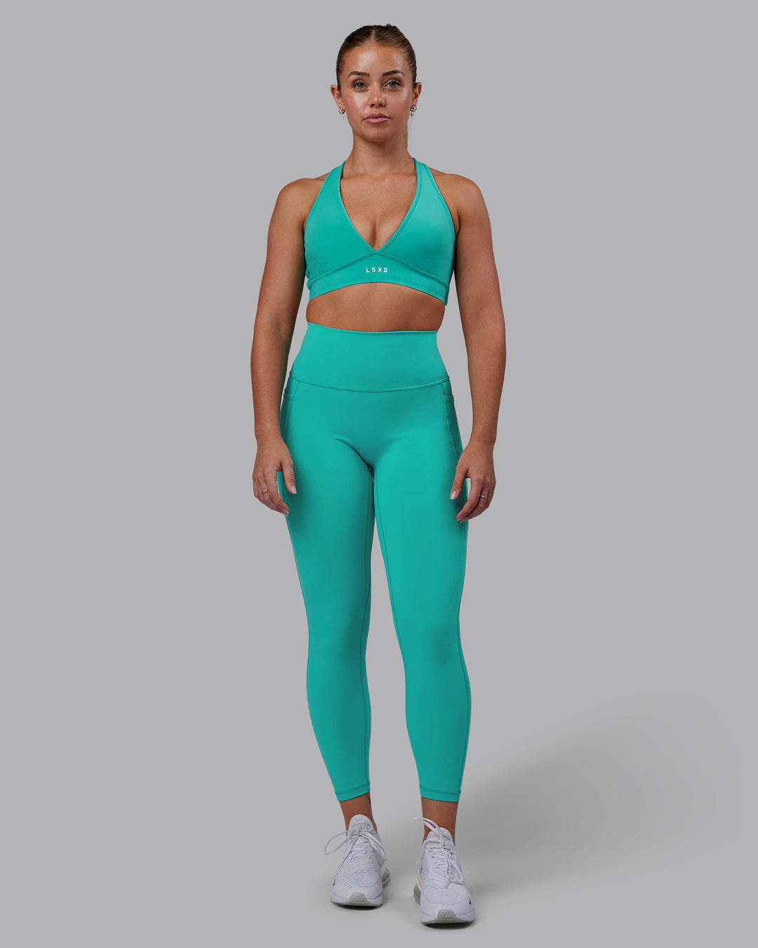 Woman wearing Fusion 7/8 Length Tights - Turquoise Tide