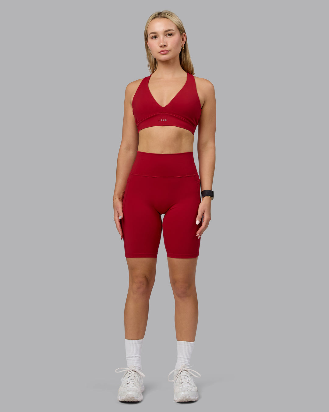 Woman wearing Fusion Bike Shorts with Pockets - Cherry Red