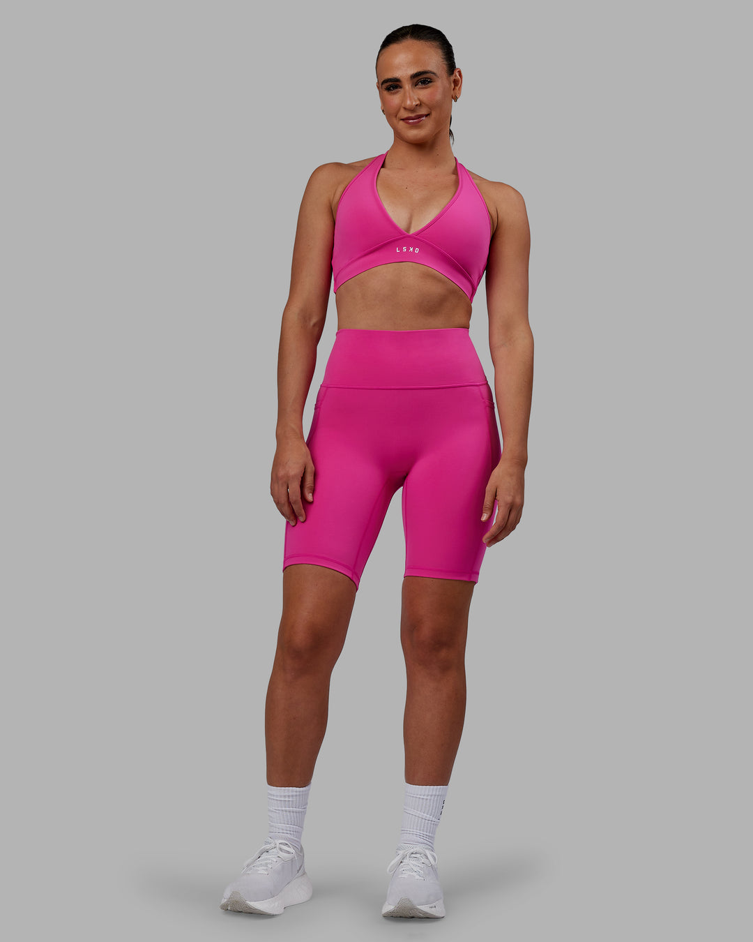 Woman wearing Fusion Bike Shorts - Fuchsia Pink