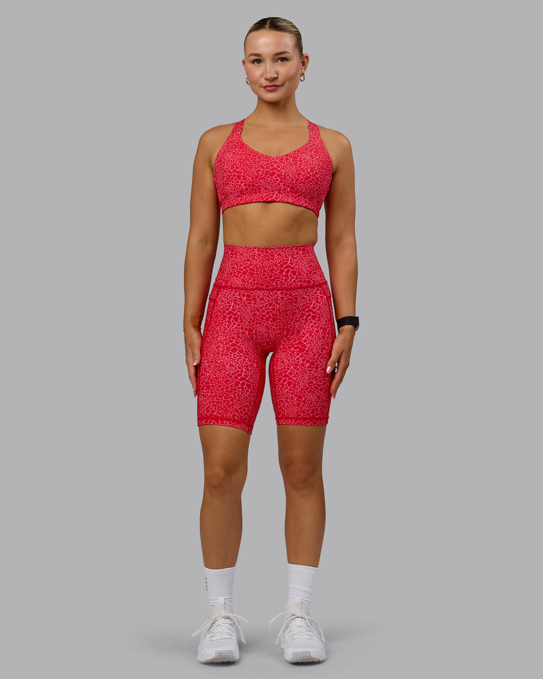 Woman wearing Fusion Bike Shorts - Red Vitality Print