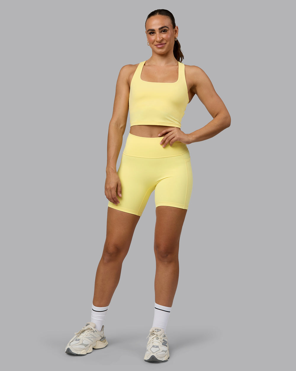 Woman wearing Fusion Mid Short Tights with Pockets - Lemon