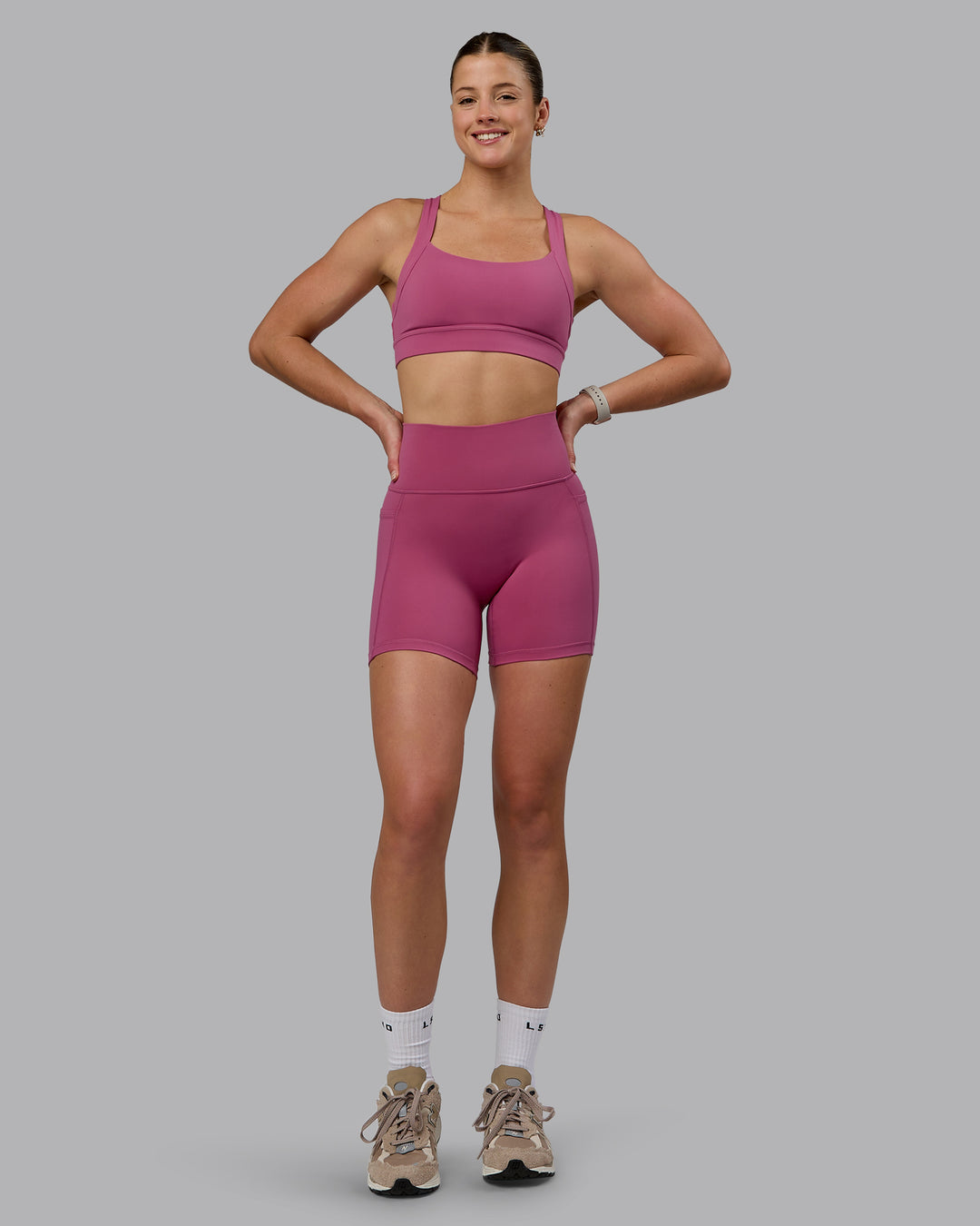 Woman wearing Fusion Mid Short Tights with Pockets - Mauve Haze