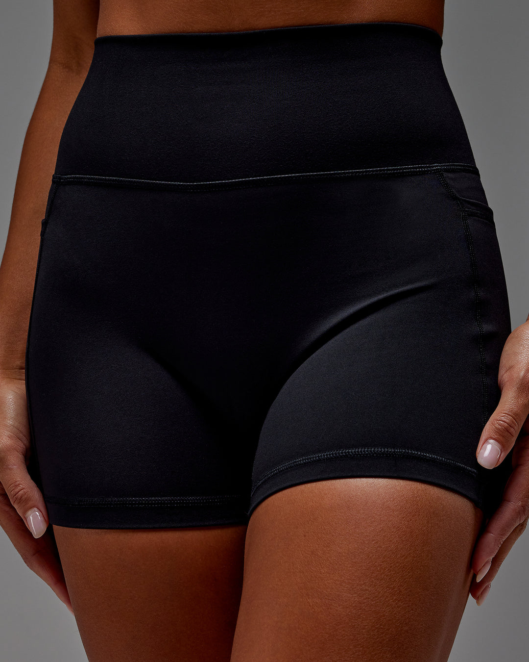 Woman wearing Fusion X-Short Tight With Pockets in Black | Model:Demi | Size:S