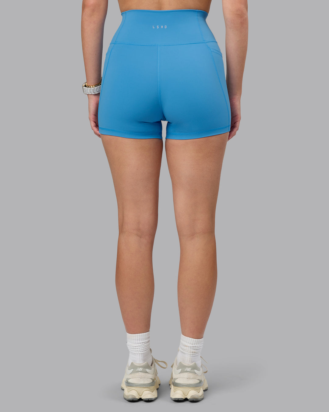 Woman wearing Fusion X-Short Tights With Pockets in Azure Blue | Size:S