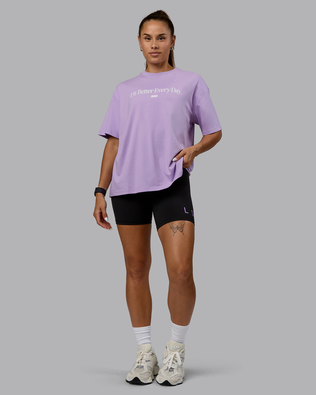 Woman wearing Go-To 1% Better FLXCotton Oversized Tee - Pale Lilac-White