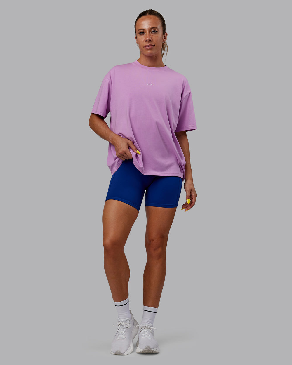 Woman wearing Go-To FLXCotton Oversized Tee - Light Violet-White