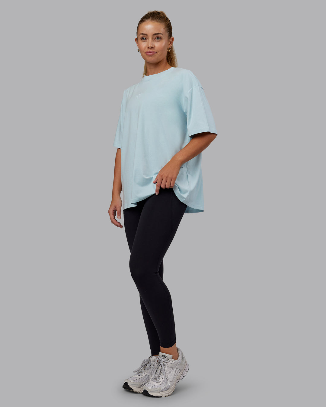 Woman wearing Go-To FLXCotton Oversized Tee - Skyride-White | Size:S | Model:Hannah