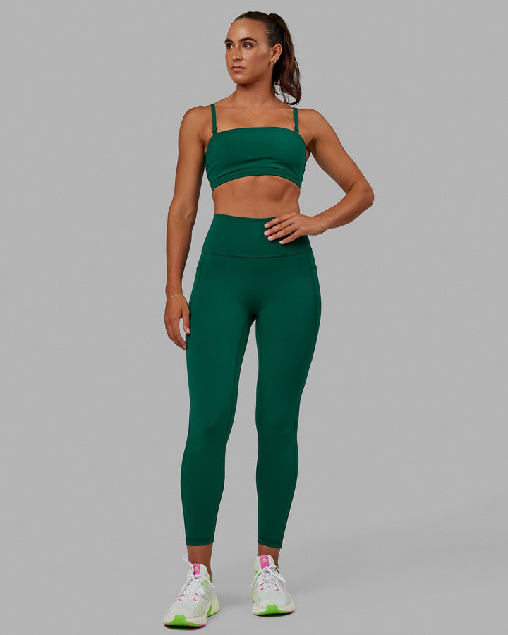 Woman wearing Inspire Sports Bra - Malachite
