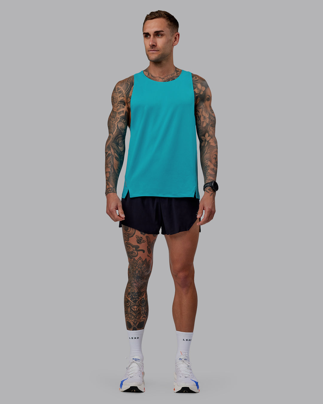 Man wearing Pace Running Tank - Blue Bird