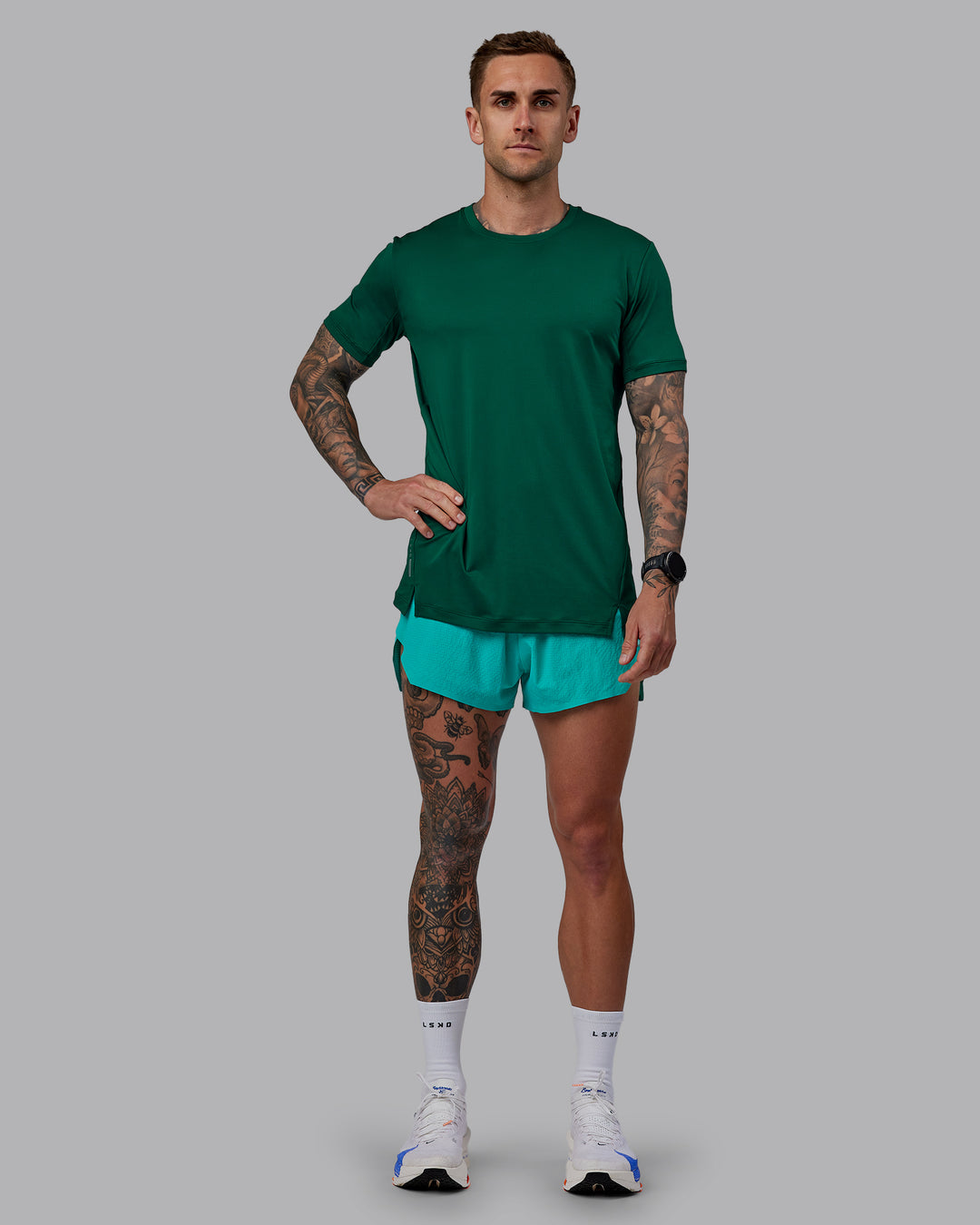 Man wearing Pace Running Tee - Malachite