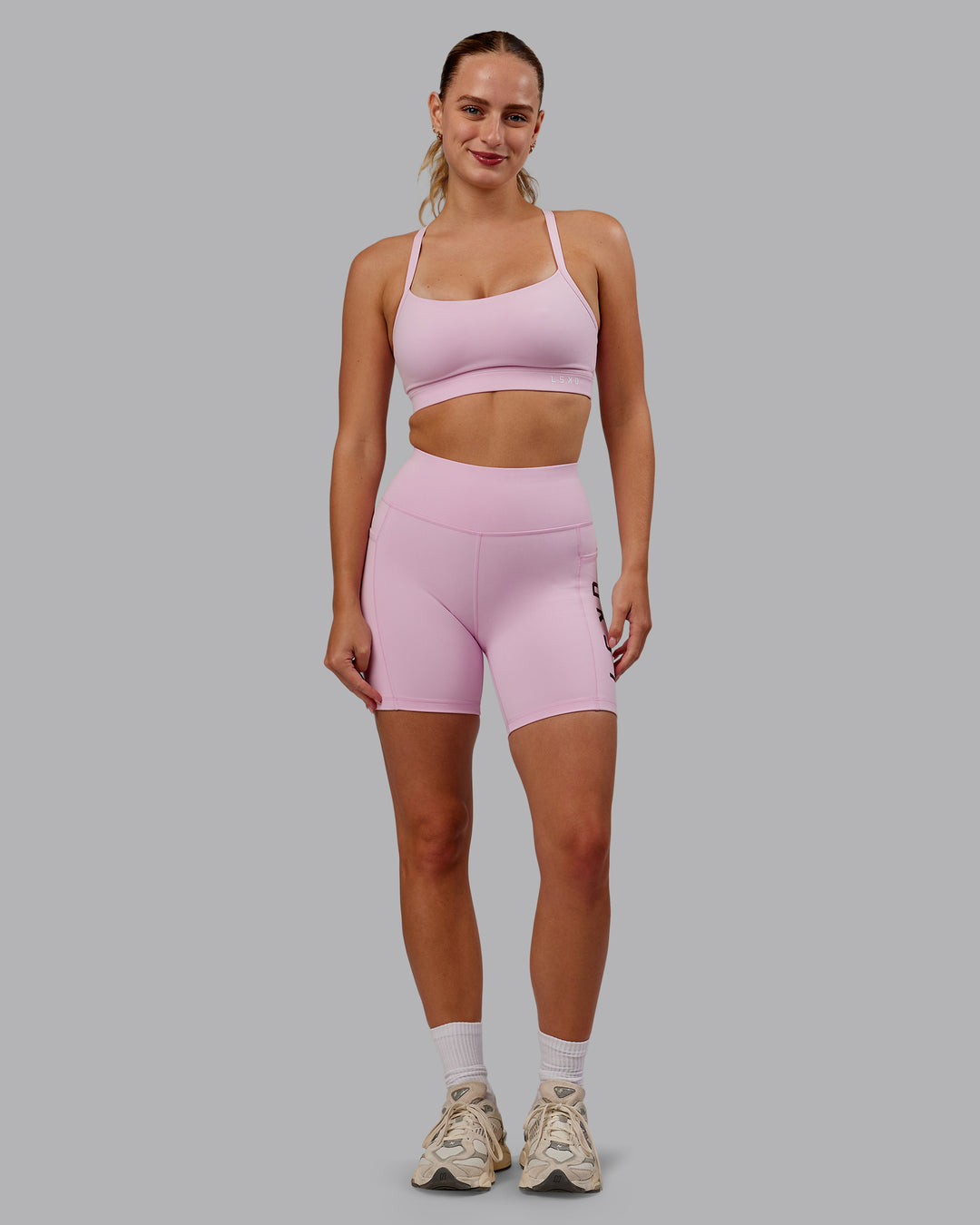 Woman wearing Momentum Sports Bra D/DD/E - Marshmallow