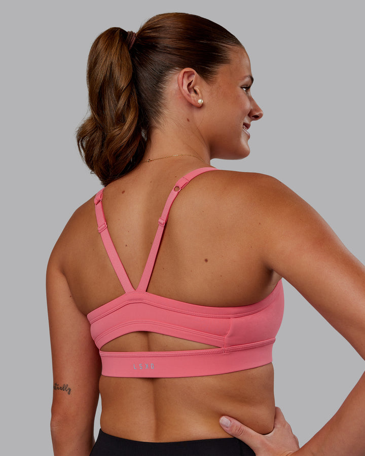 Woman wearing Momentum Sports Bra - Pink Lemonade | Model:Phoebe | Size:S
